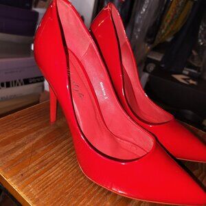 Red pumps size 8